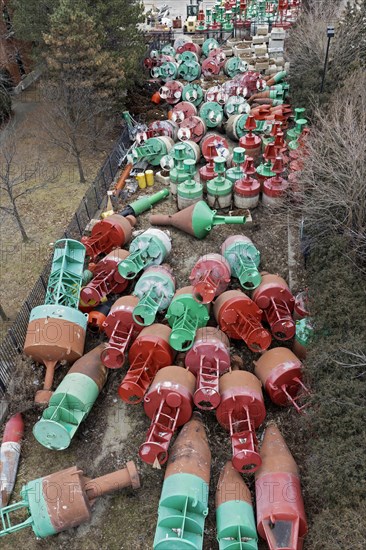 Detroit, Michigan, Navigational buoys stored at the U.S. Coast Guard station. The buoys mark the shipping channel from Saginaw Bay in Lake Huron through the St. Clair River, Lake St. Clair, and the Detroit River to Lake Erie. Many buoys are removed from the water and stored at the Coast Guard station for the winter