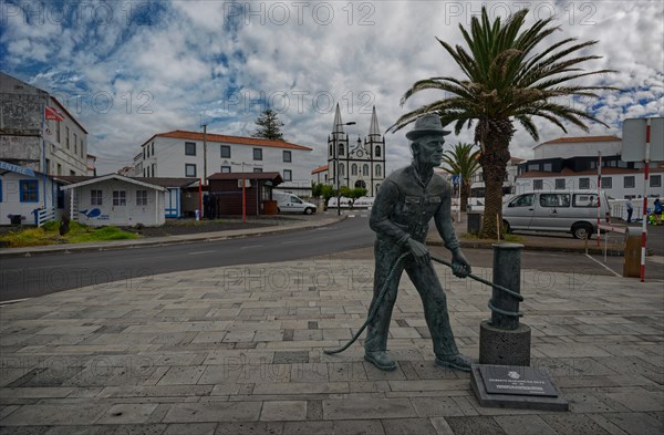 Statue by Gilberto Mariano da Silva of a sailor with rope at the old harbour of the island's capital Madalena, Madalena, Pico, Azores, Portugal, Europe