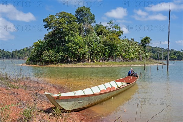 Wooden tourist boat at Brokopondo reservoir, Brokopondostuwmeer, artificial lake created by constructing the Afobaka Dam across the Suriname River