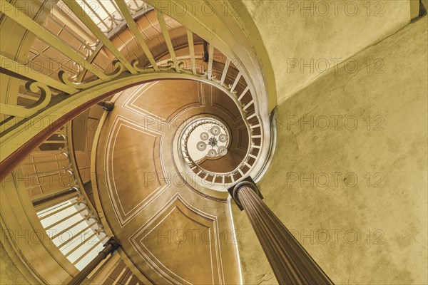 Impressive perspective of a spiral staircase with an oval course and lighting at the top, Schachtrupp Villa, Lost Place, Osterode am Harz, Lower Saxony, Germany, Europe