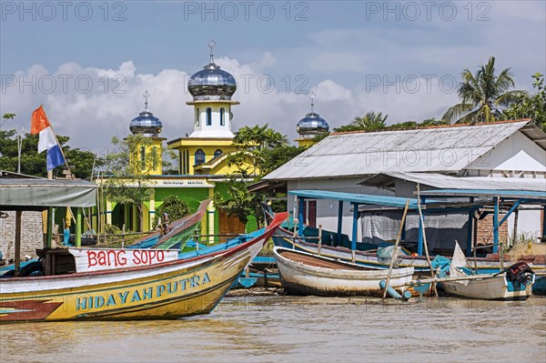 Boats and mosque in little Indonesian village between Pangandaran and Cilacap, West Java, Indonesia, Asia