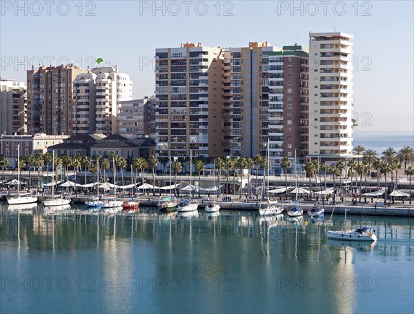 Apartment blocks and yachts in marina of Muelle Uno port development, city of Malaga, Spain, Europe