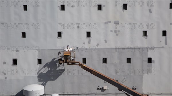 RFA Mounts Bay ship in dry dock being painted, Falmouth, Cornwall, England, UK