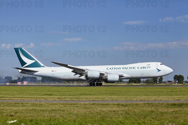 Cathay Pacific Cargo Boeing 747-867F with registration B-LJI lands on the Polderbaan, Amsterdam Schiphol Airport in Vijfhuizen, municipality of Haarlemmermeer, Noord-Holland, Netherlands