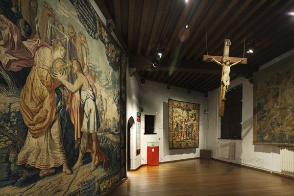 Medieval tapestries in the Gruuthuse chapel, Bruges, Belgium, Europe