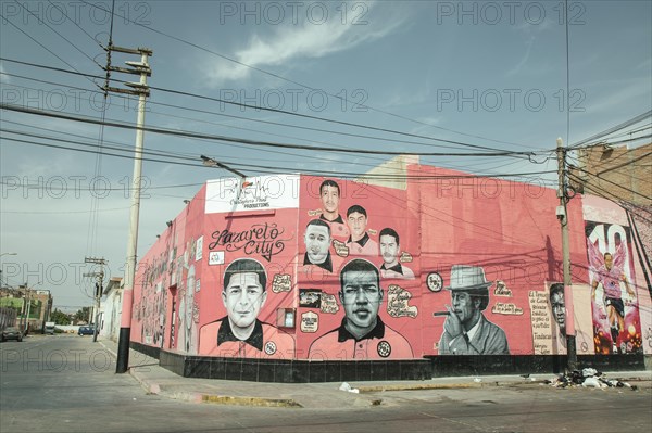 Graffito, portraits of various salsa musicians in the historic centre of Callao, Peru, South America