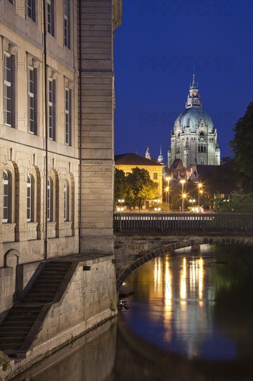 The state parliament in the former Leineschloss castle and the New City Hall, Neues Rathaus at night in Hannover, Lower Saxony, Germany, Europe