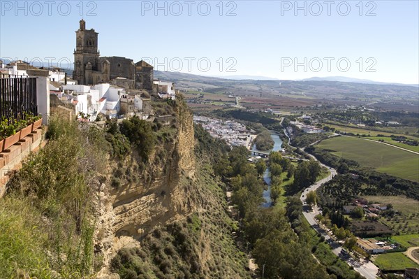 Cliff top buildings church of San Pedro, village of Arcos de la Frontera, Cadiz province, Spain, Europe