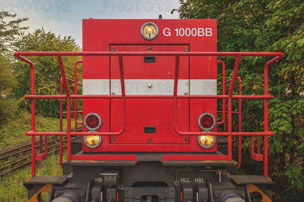 Front view of a red locomotive with headlights and metal grille, Lower Rhine, North Rhine-Westphalia, Germany, Europe