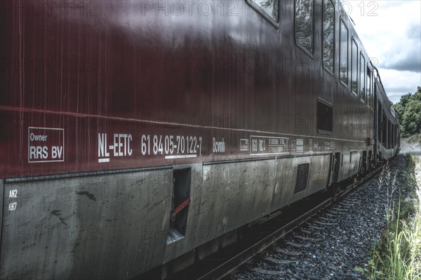 Close-up of a red train carriage with focus on the side lettering, Dornap-Hahnenfurth railway station, Wuppertal, North Rhine-Westphalia, Germany, Europe