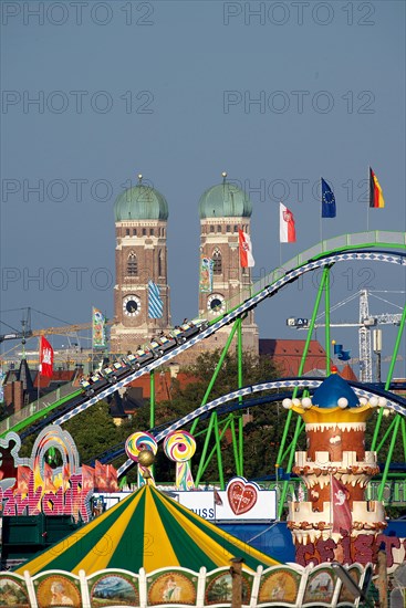Oktoberfest, afternoon with alpine railway in front of the Church of Our Lady, Munich, Bavaria, Germany, Europe