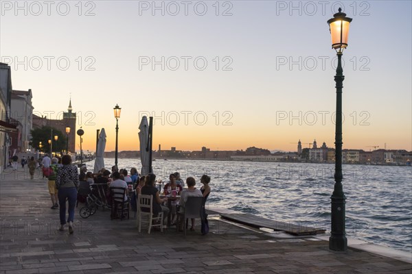 Restaurant on the waterfront of the Guidecca Canal, Dorsoduro district, Venice, Veneto, Italy, Europe