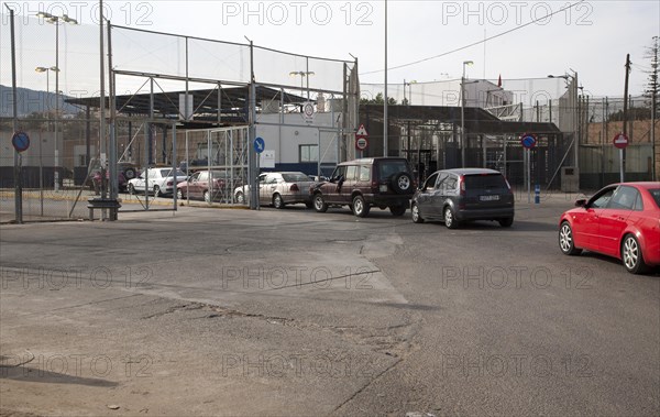 Line of cars wait at the Moroccan border in Melilla autonomous city state Spanish territory in north Africa, Spain cars line up at border checkpoint with Morocco