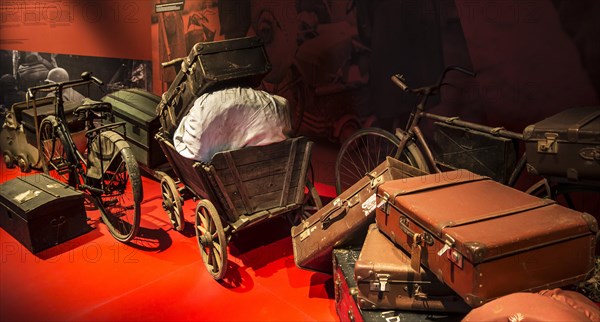 Belongings of fugitives, refugees fleeing from German occupation in the Bastogne War Museum devoted to the Second World War Two Battle of the Bulge in the Belgian Ardennes, Belgium, Europe