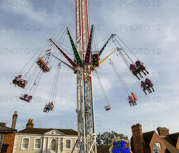 Mops fair fairground, High Street, Marlbrough, Wiltshire, England, UK October 7th 2023, Air Swing ride