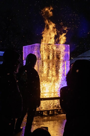 Detroit, Michigan, The Fire & Ice Festival on the Detroit Riverwalk featured ice carvings, one of which, and Ice Tower, was set on fire