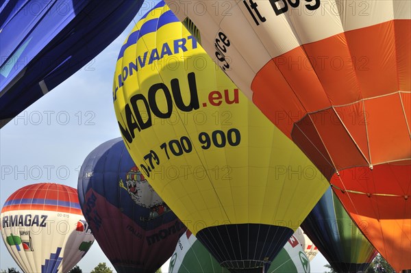 Balloonists, Aeronauts in hot-air balloons during ballooning meeting