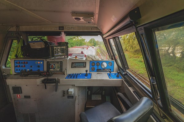 Interior view of an engine driver's cab with controls and view through the window, Lower Rhine, North Rhine-Westphalia, Germany, Europe