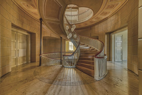 An elegant, curved wooden staircase in a room with natural lighting, Schachtrupp Villa, Lost Place, Osterode am Harz, Lower Saxony, Germany, Europe
