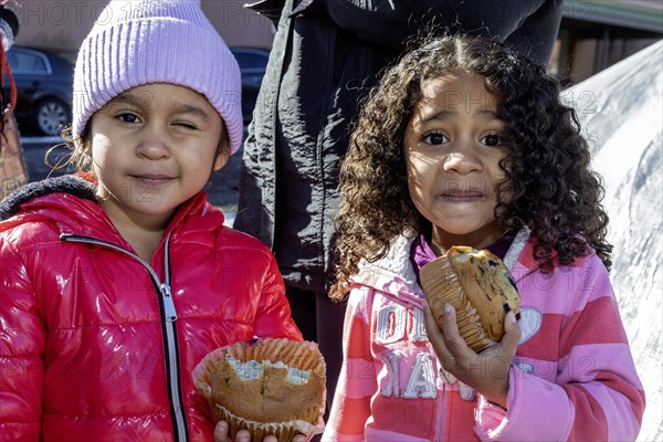 Denver, Colorado, Immigrants, mostly from Venezuela, live in a tent camp near downtown Denver. The city helped about 35, 000 migrants in 2023 with food and temporary shelter, but more continue to arrive daily on buses from the southern border