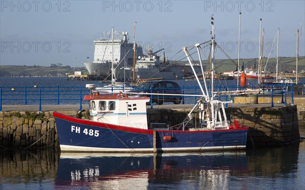 Small fishing boat at quayside, Custom House Quay, Falmouth, Cornwall, England, UK