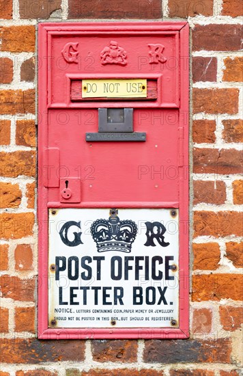 King George VI disused red wall Post Office letter box, Great Glemham, Suffolk, England, UK, do not use