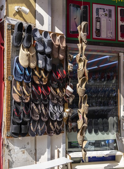 Shoe shops and craftsmen in the Al Fahidi neighbourhood, Dubai, United Arab Emirates, Asia