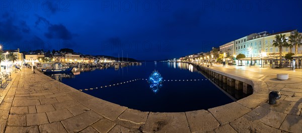 Blue hour, harbour of Mali Losinj, illuminated Christmas tree in the harbour basin, panoramic shot, island of Losinj, Kvarner Gulf Bay, Adriatic Sea, Croatia, Europe