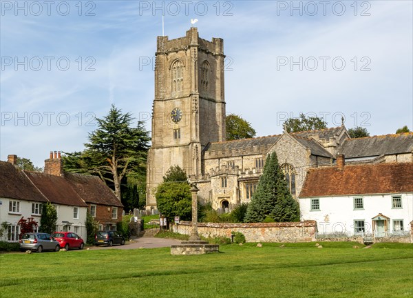 Historic buildings cottages and church of Saint Michael, Aldbourne, Wiltshire, England, UK