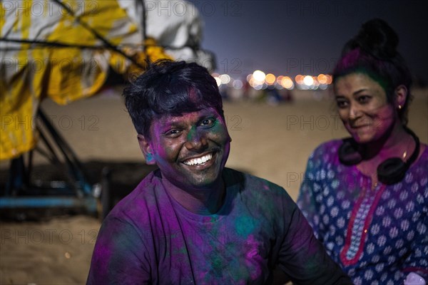 Young people, Holi Festival, Indian spring festival, traditional festival of colours, Marina Beach, Chennai, Tamil Nadu, India, Asia