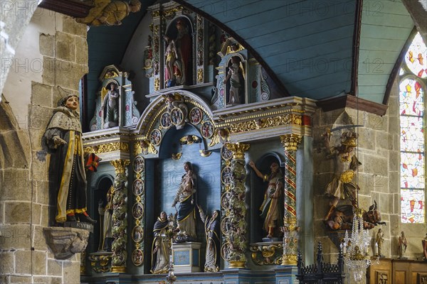 Left side altar in Baroque style, Enclos Paroissial enclosed parish of Guimiliau, Finistere Penn ar Bed department, Brittany Breizh region, France, Europe