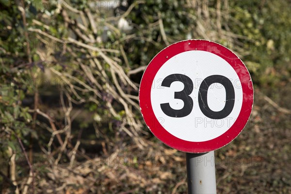 Close-up of thirty miles per hour speed limit sign, UK