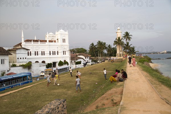 Fort ramparts of historic town of Galle, Sri Lanka, Asia with lighthouse and Meeran Jumma mosque, Asia