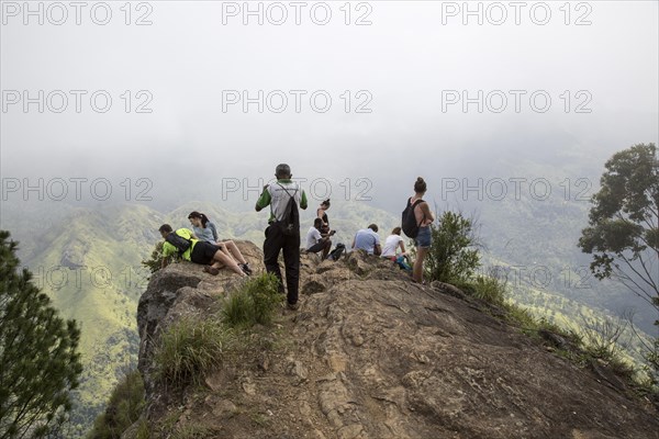 Walkers on the peak of Ella Rock mountain, Ella, Badulla District, Uva Province, Sri Lanka, Asia