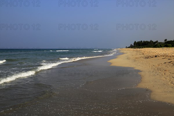 Ocean and sandy tropical beach at Nilavelli, Trincomalee, Sri Lanka, Asia