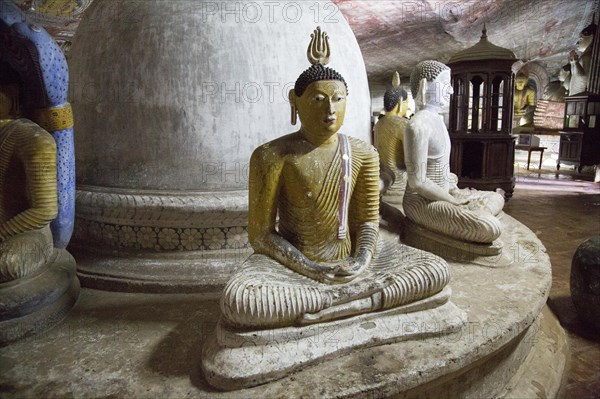 Buddha figures inside Dambulla cave Buddhist temple complex, Sri Lanka, Asia