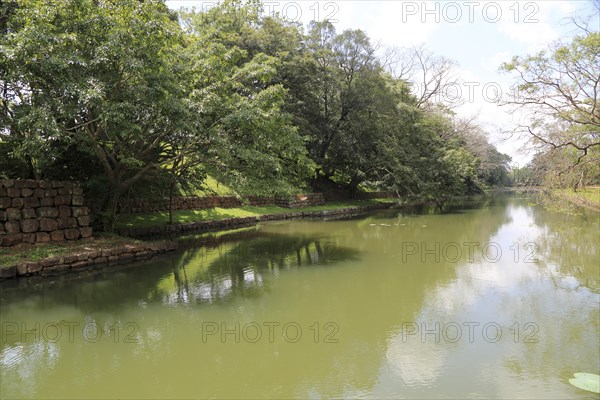 Water filled moat at the rock palace gardens Sigiriya, Central Province, Sri Lanka, Asia