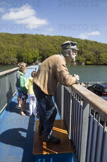 Sculpture of an Old Man on the King Harry Ferry Bridge vehicular chain ferry crossing River Fal, Cornwall, England, UK