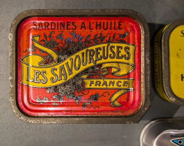 French red sardine tin of Les Savoureuses in the Port Musee, boat museum at Douarnenez, Finistere, Brittany, France, Europe