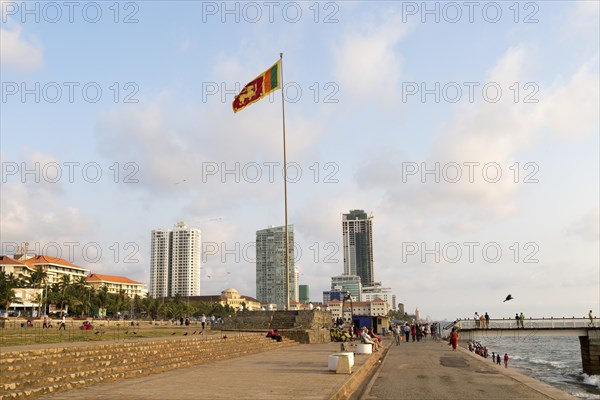 National flag and High rise buildings Galle Face Green, Colombo, Sri Lanka, Asia