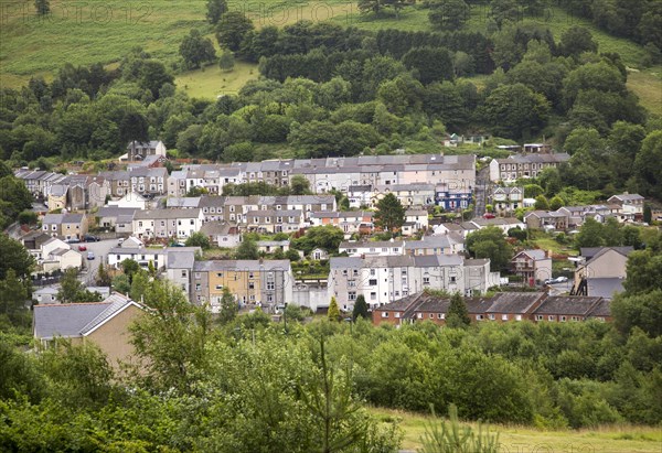 Terraced housing on hillside, at Six Bells, Abertillerry, Blaenau Gwent, South Wales, UK