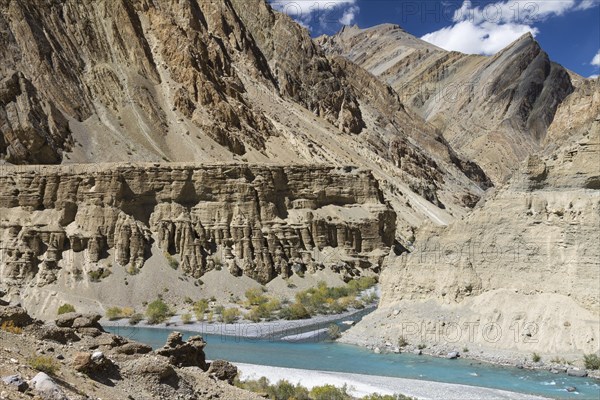 The confluence of Tsarab and Zara rivers, seen late in the summer, from a remote trekking route across the Zanskar Range of the Himalayas. Kargil District, Union Territory of Ladakh, India, Asia