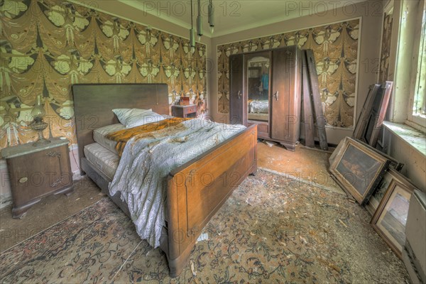 The image of an abandoned bedroom that conveys a sense of abandonment, Maison Limmi, Lost Place, Kalken, Laarne, Province of East Flanders, Belgium, Europe
