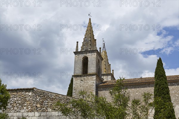 Church tower of L'Abbatiale de Goudargues in Goudargues, Departement Gard, Occitanie region, France, Europe