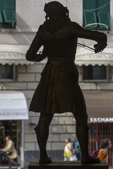Silhouette of the bronze statue of the violinist Niccolo Paganini by the artist Niccolo Tommaseo, entrance hall of the Teatro Carlo Felice, Passo Eugenio Montale, 4, Genoa, Italy, Europe