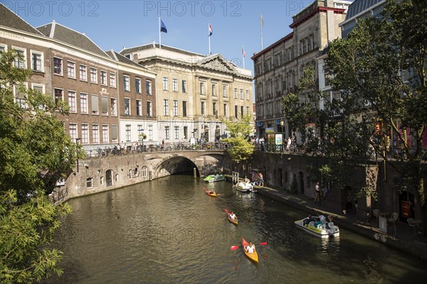 People kayaking near the Stadhuis, Oudegracht canal, Utrecht, Netherlands