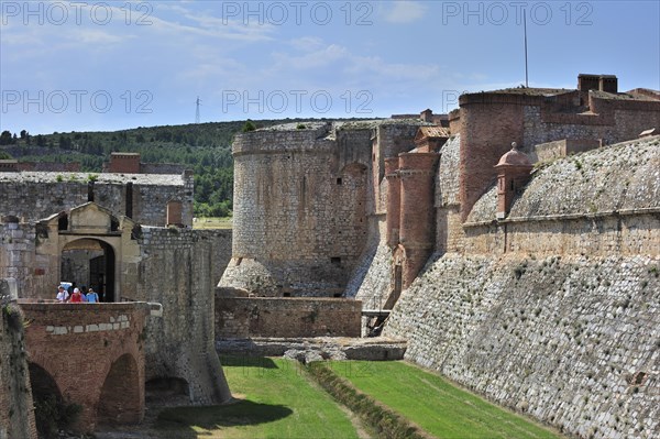 Moat and ramparts of the Catalan fortress Fort de Salses at Salses-le-Chateau, Pyrenees, France, Europe