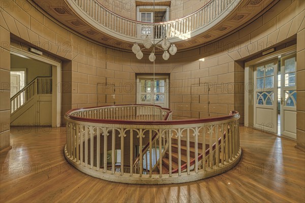 An empty staircase with curved banister in a historic building, Schachtrupp Villa, Lost Place, Osterode am Harz, Lower Saxony, Germany, Europe