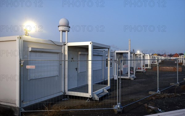 Around 800 refugees from Ukraine are housed in containers in a refugee shelter on Tempelhofer Feld, Berlin, 15 December 2022