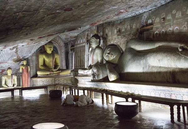 Buddha figures inside Dambulla cave Buddhist temple complex, Sri Lanka, Asia